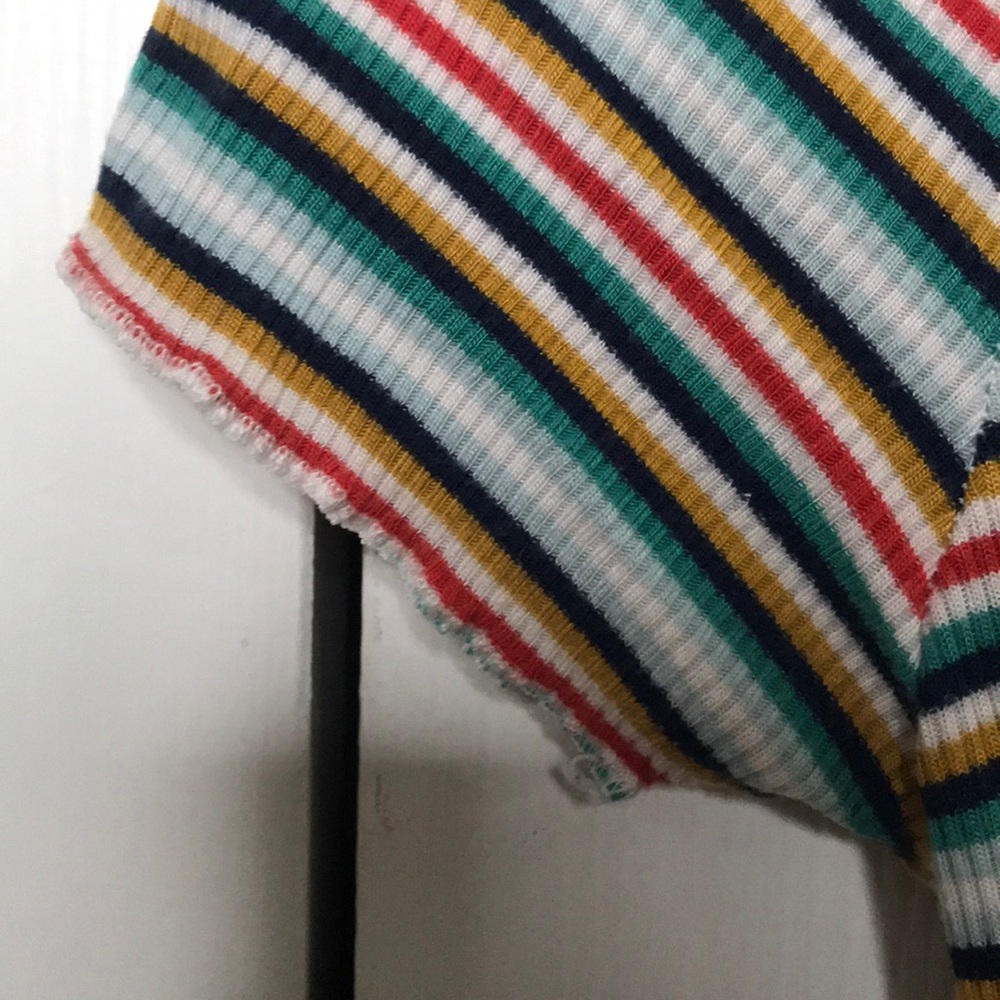 A striped blue,green,white,red,yellow t-shirt. - Picture 4 of 4